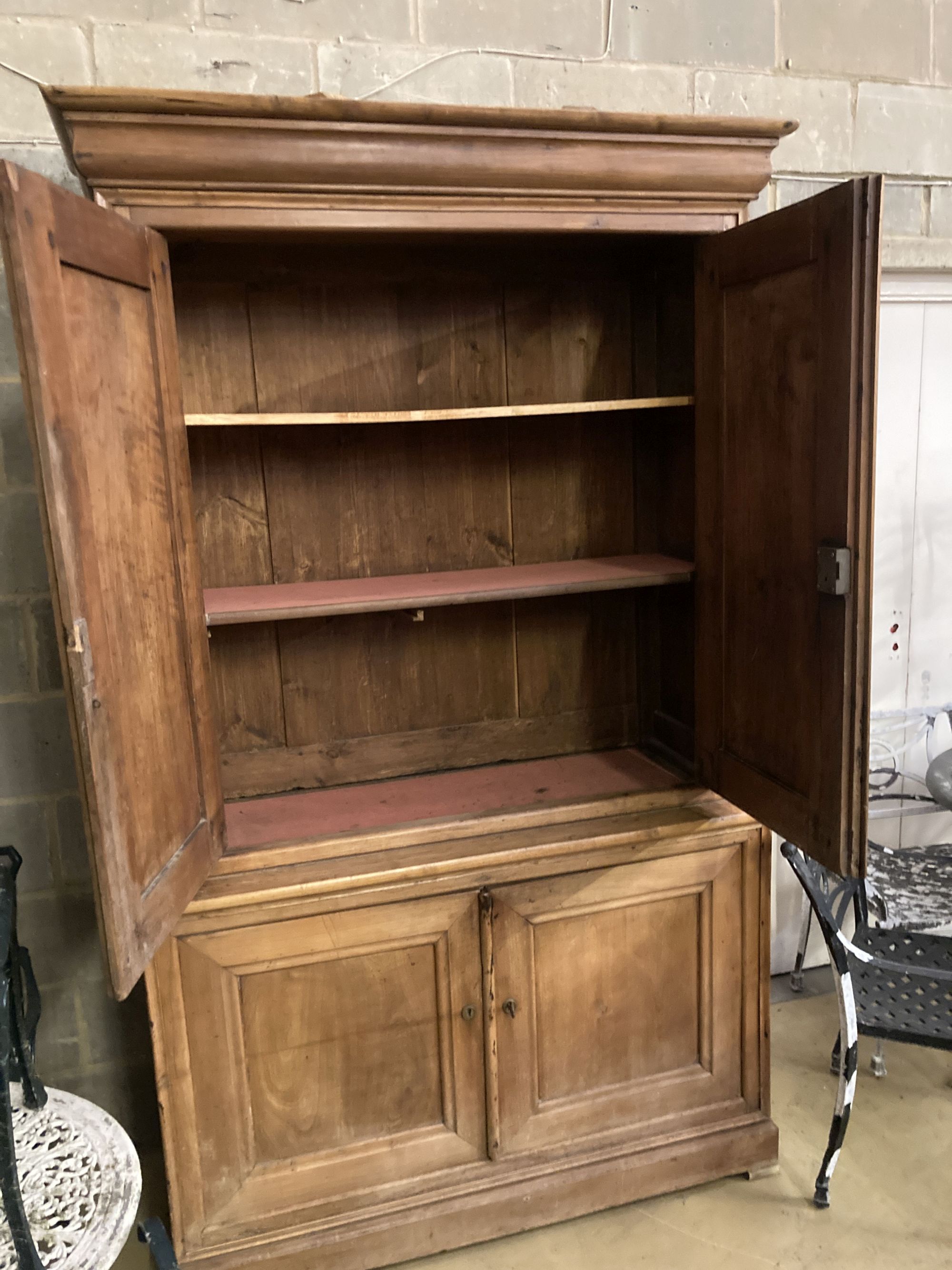 An early 19th century French cherry four door buffet, length 138cm, depth 54cm, height 226cm